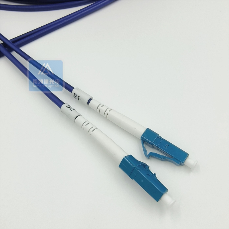 LSZH FTTX FC LC Duplex Armored Fiber Optic Patch Cord 50m 3.3mm Blue